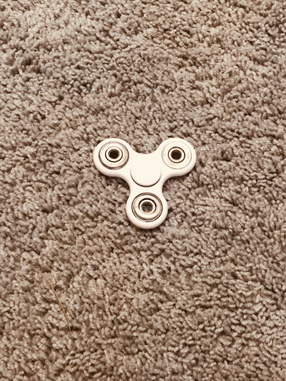 Figured spinner on the carpet