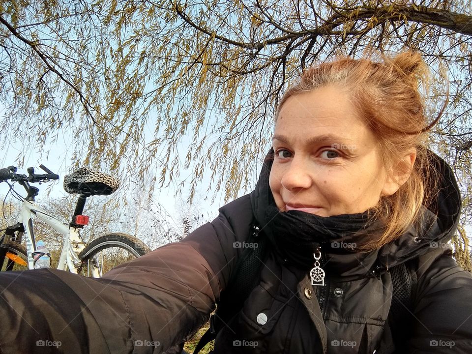 selfie girl riding bike on the nature lovers