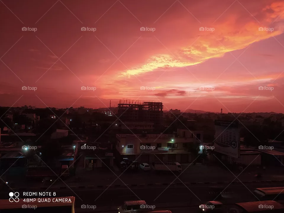 red colour sprayed in whole sky at evening