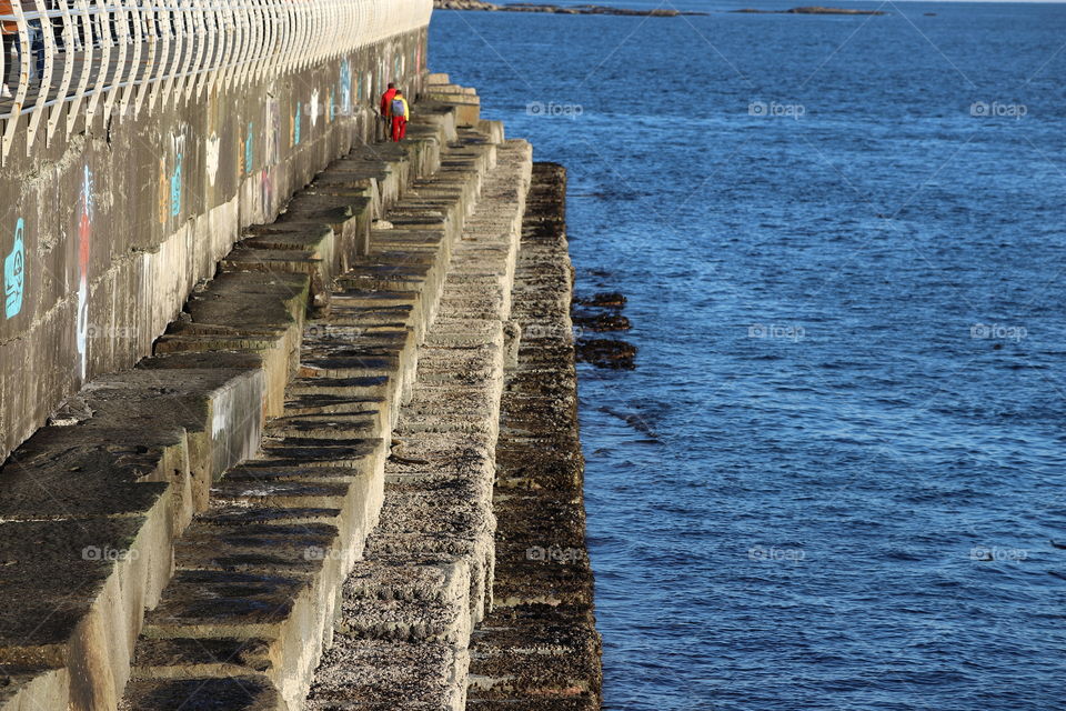 Walking in stone steps by the ocean 