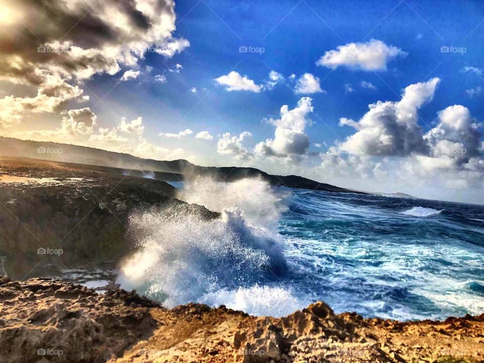 Drama photo of waves crashing in Aruba during our UTV excursion with Carnival Sunshine Cruise 2018