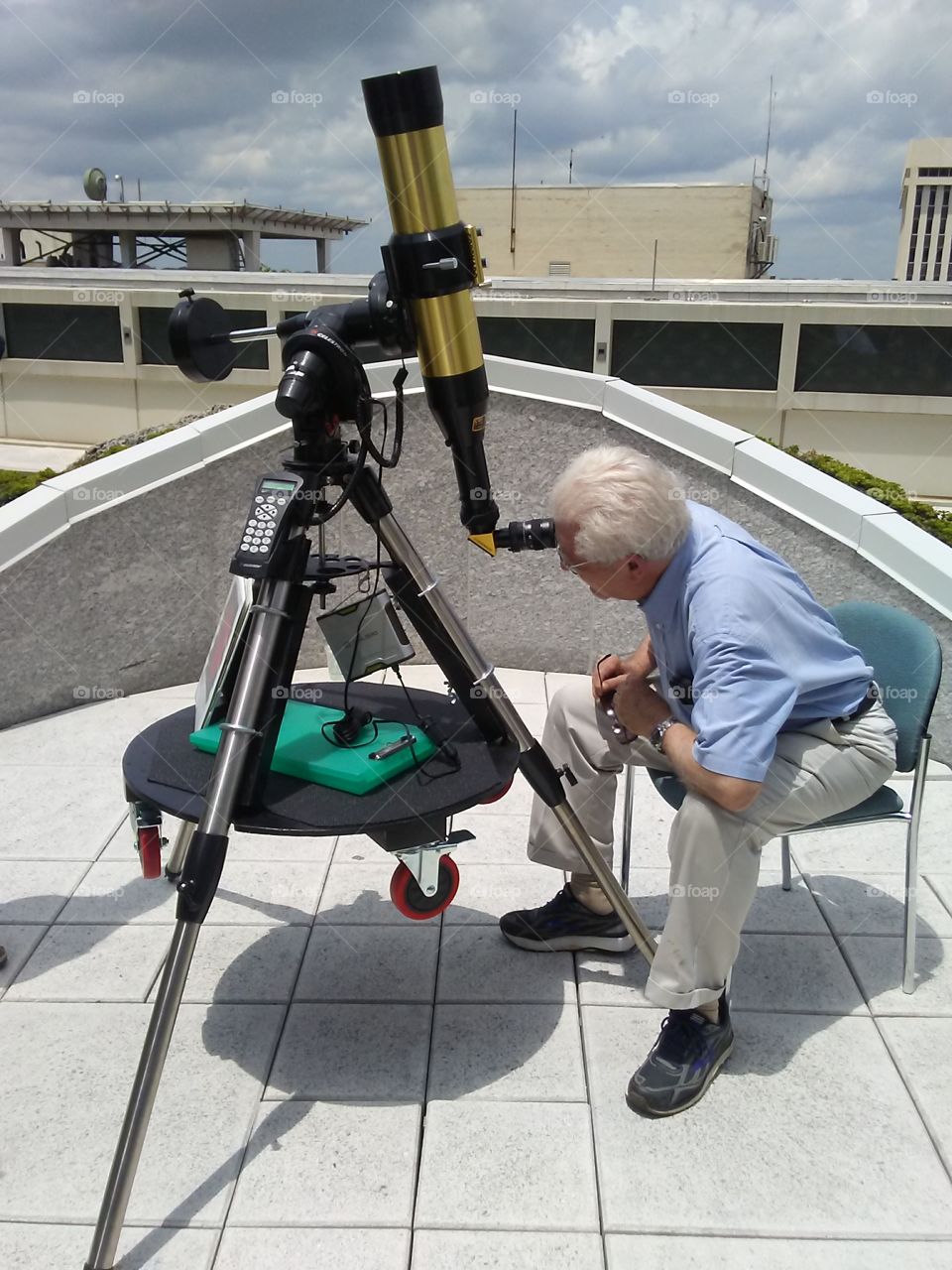 Viewing the sun through a refracting telescope