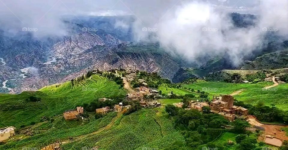 Glory be to God, the magnificent and picturesque view and the natural green trees are a view that is nothing more wonderful than it