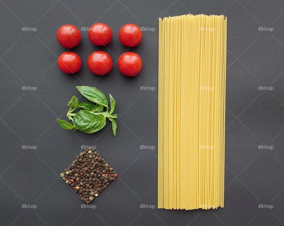 Lunch will be ready soon. Before cooking Italian pasta🍝 Pasta, tomatoes, basil, pepper.