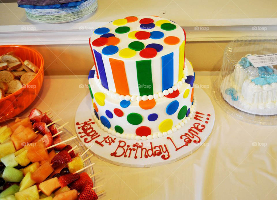 First birthday cake. Colorful polka dot and striped first birthday cake