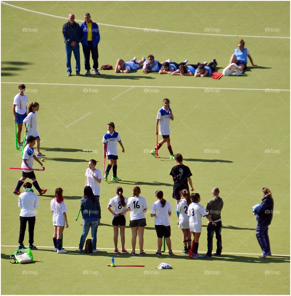 Field hockey. the girls are getting ready to start a game