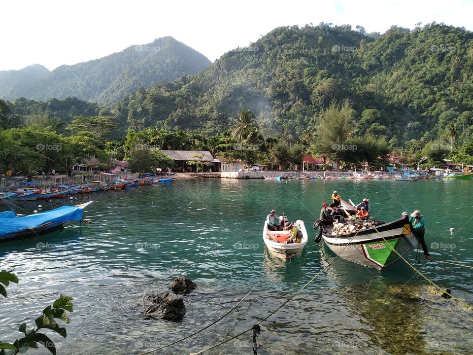 View of ships docked on the beach of Aceh, Indonesia