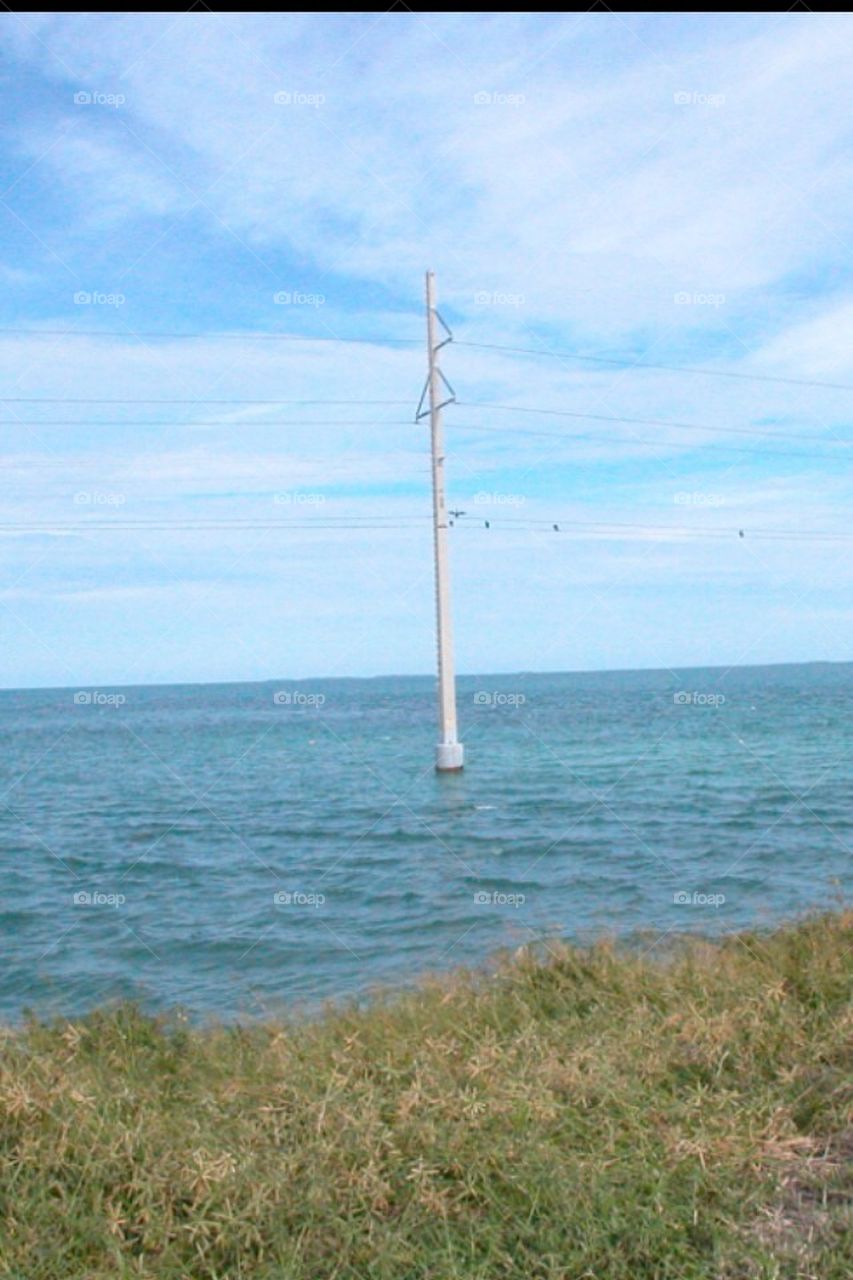 Pole in water