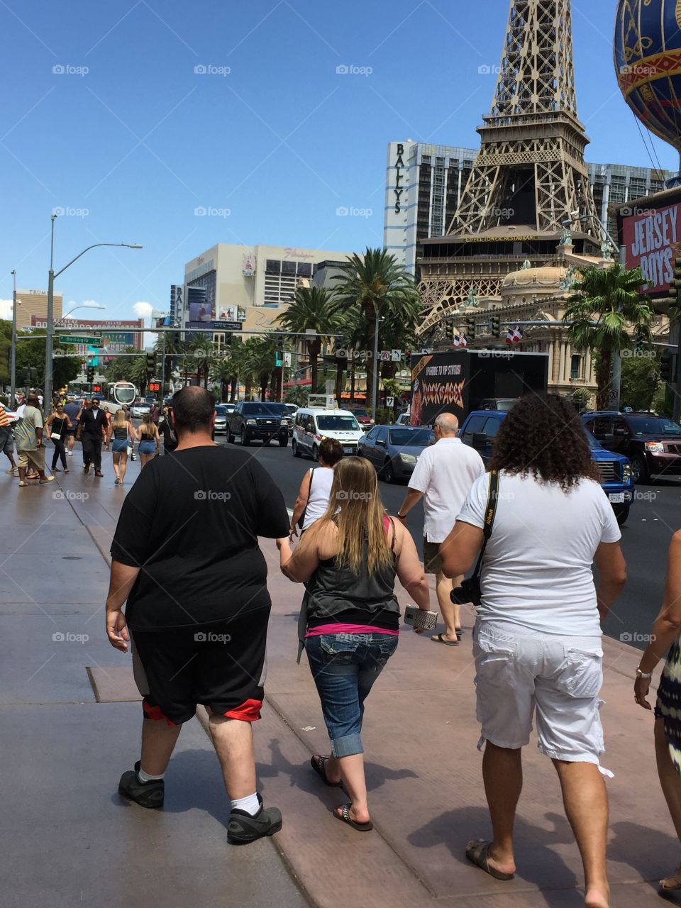 Fat persons walk in the city,Las Vegas