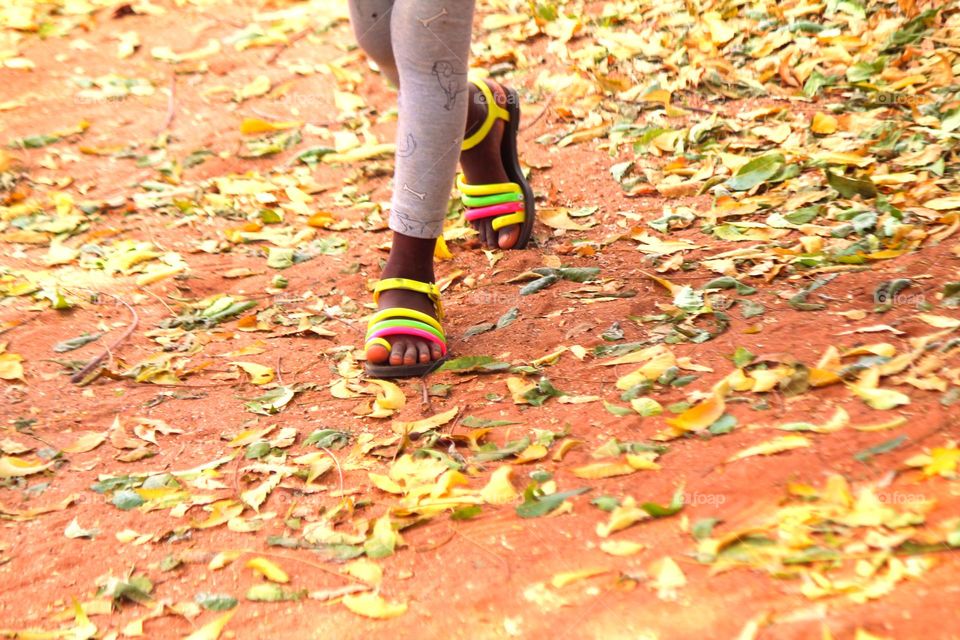 Feets child and leaf falling