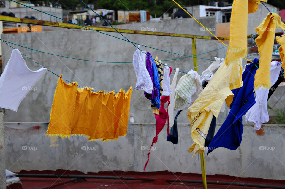 Clothes hanging on rope