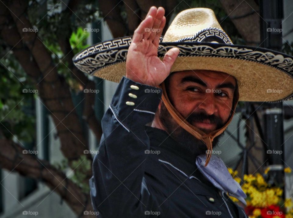 Friendly Cowboy. Handsome Mexican Cowboy In Traditional Apparel
