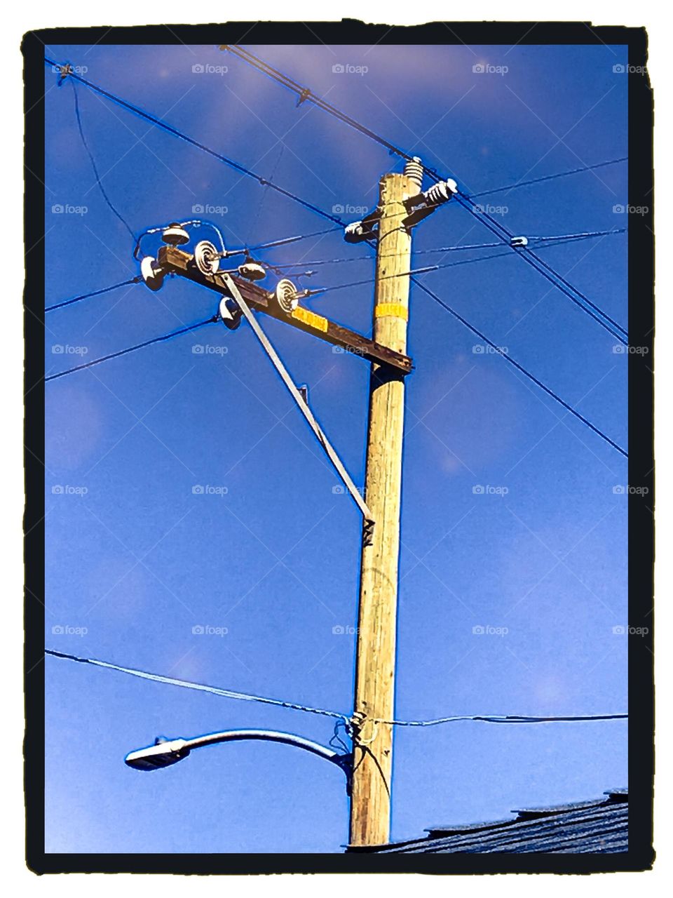 A telephone pole.