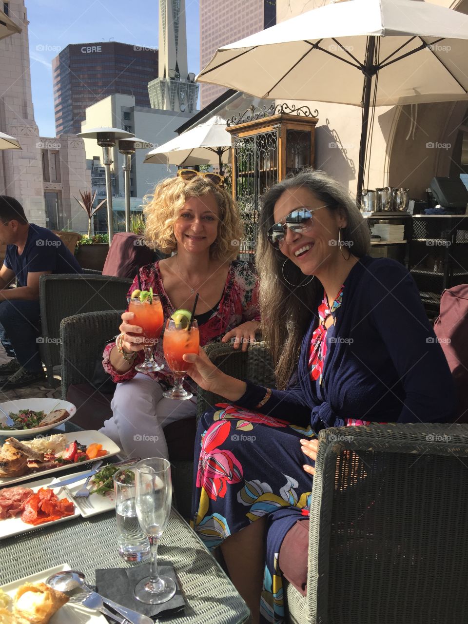 Two smiling woman's in restaurant