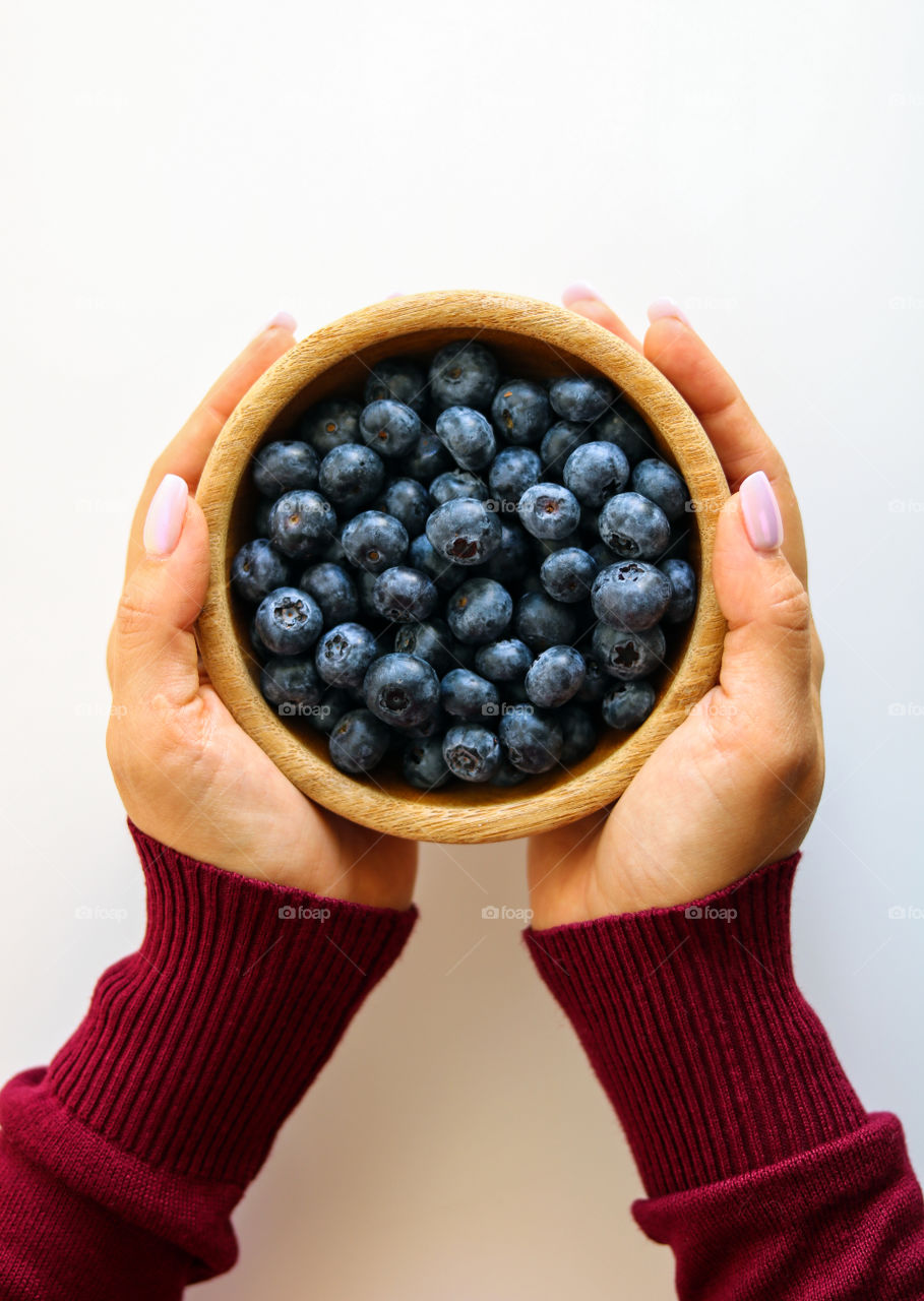 Holding Blueberries