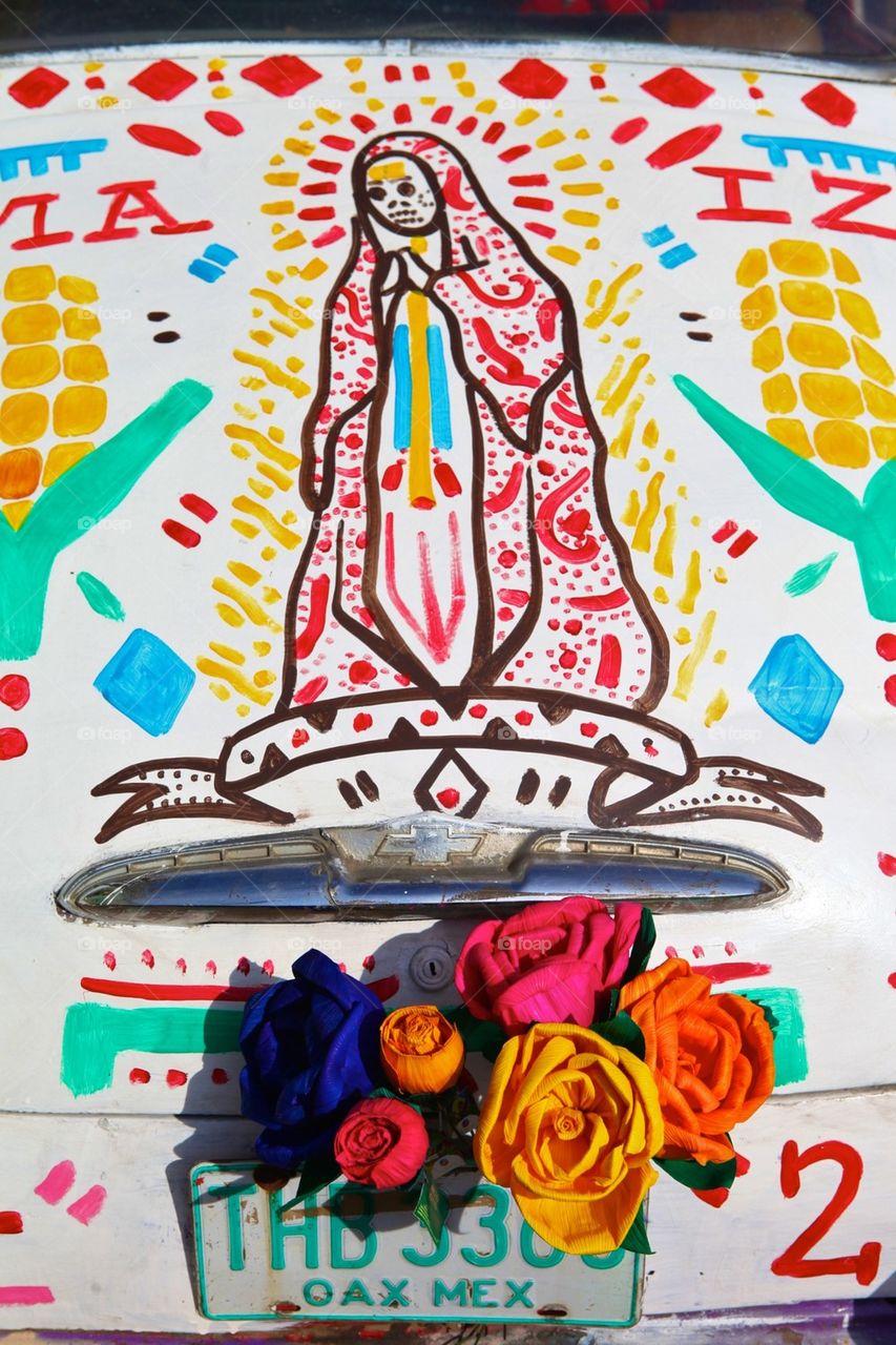 Street art on a vintage chevy trunk