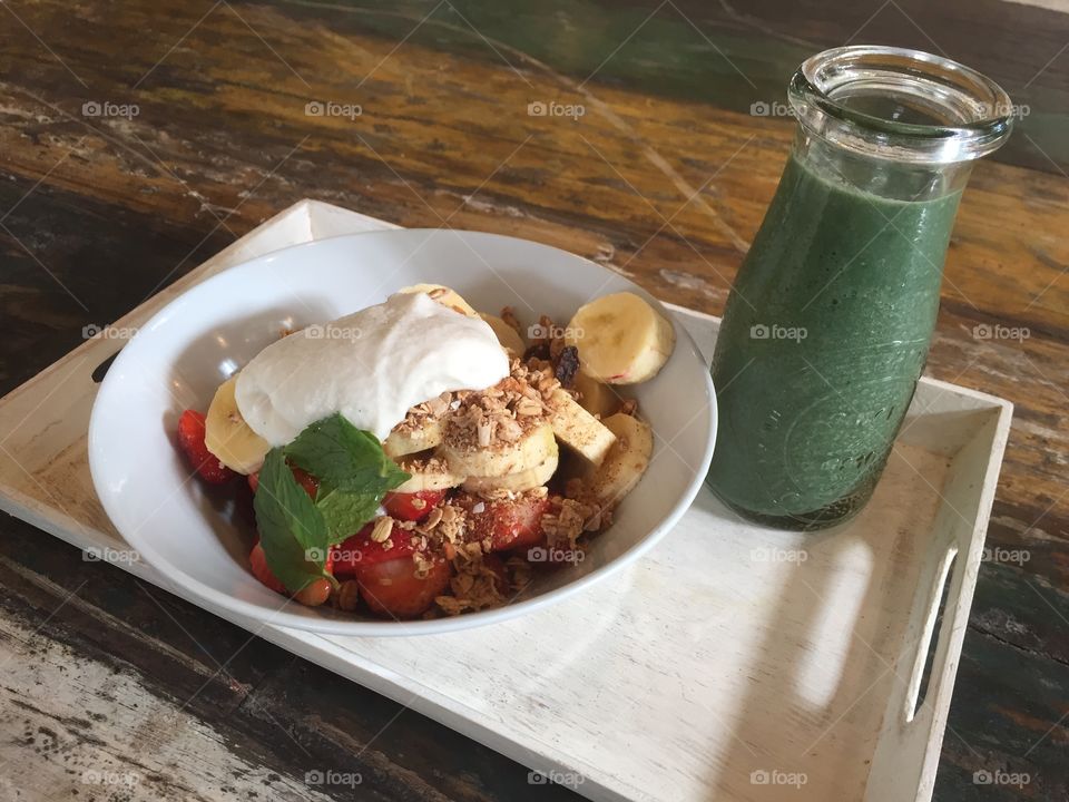 Close-up of breakfast with juice