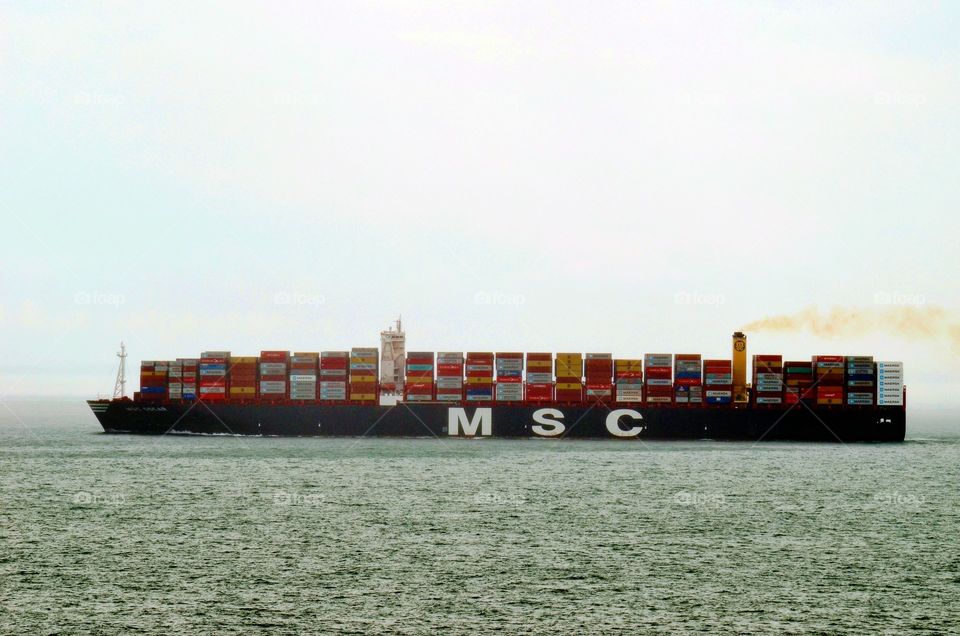 Ship passing through Malacca Straits