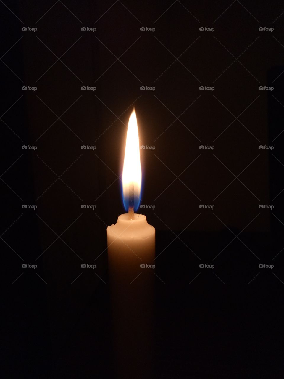 Candle light in the dark.