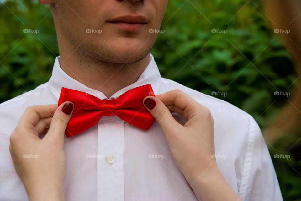 the red bow tie. groom preparations to wedding