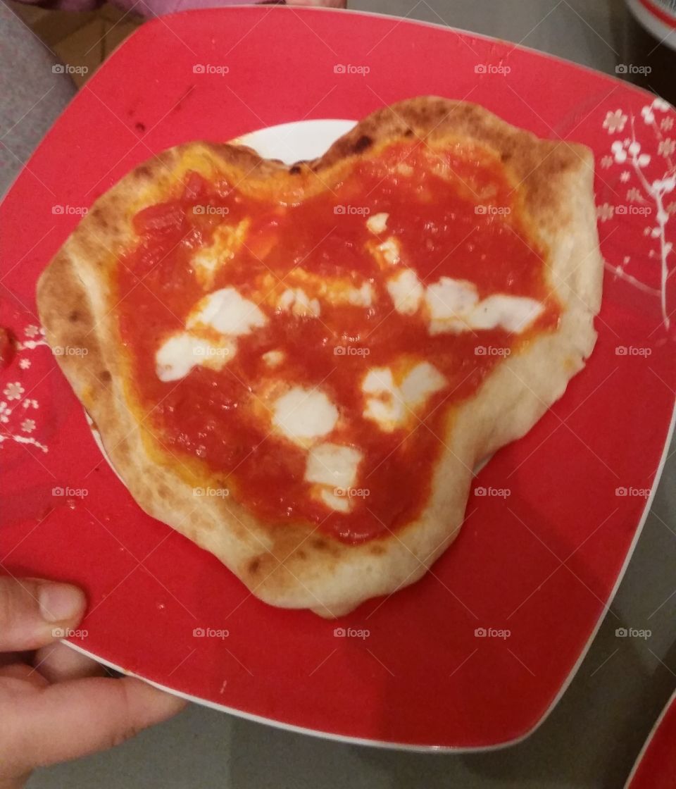 Real homemade Italian pizza, a heart of pizza