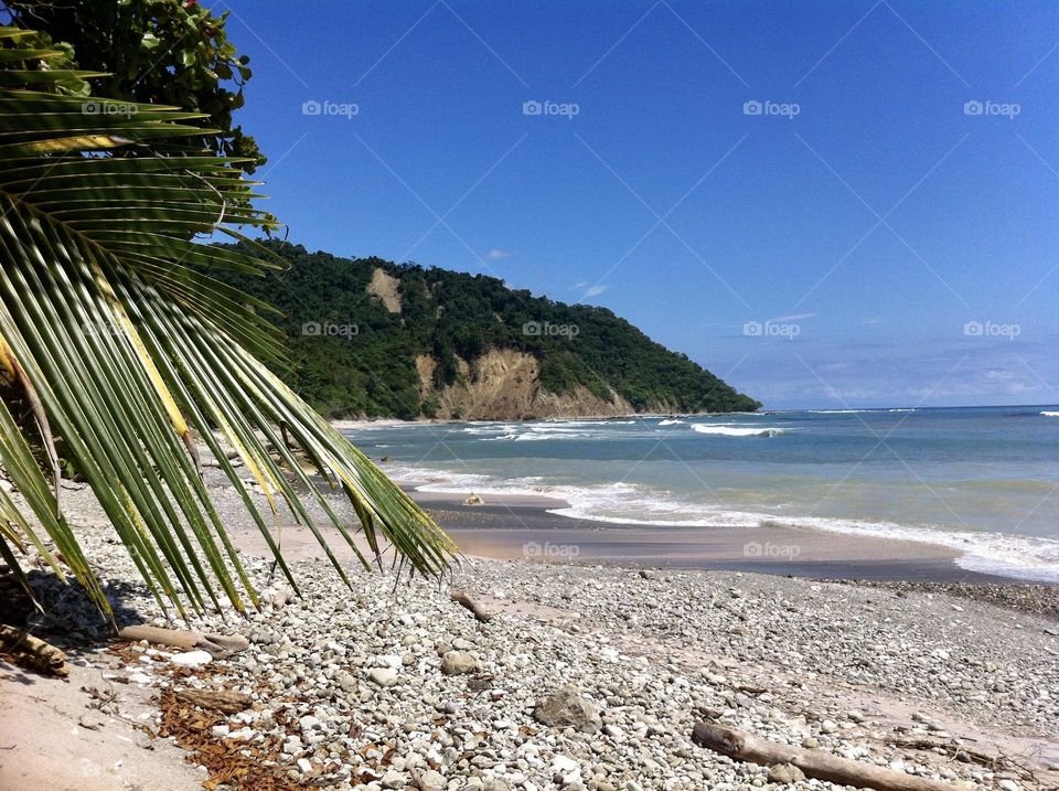 Ultimate paradise, waves crashing on the beach in Costa Rica 