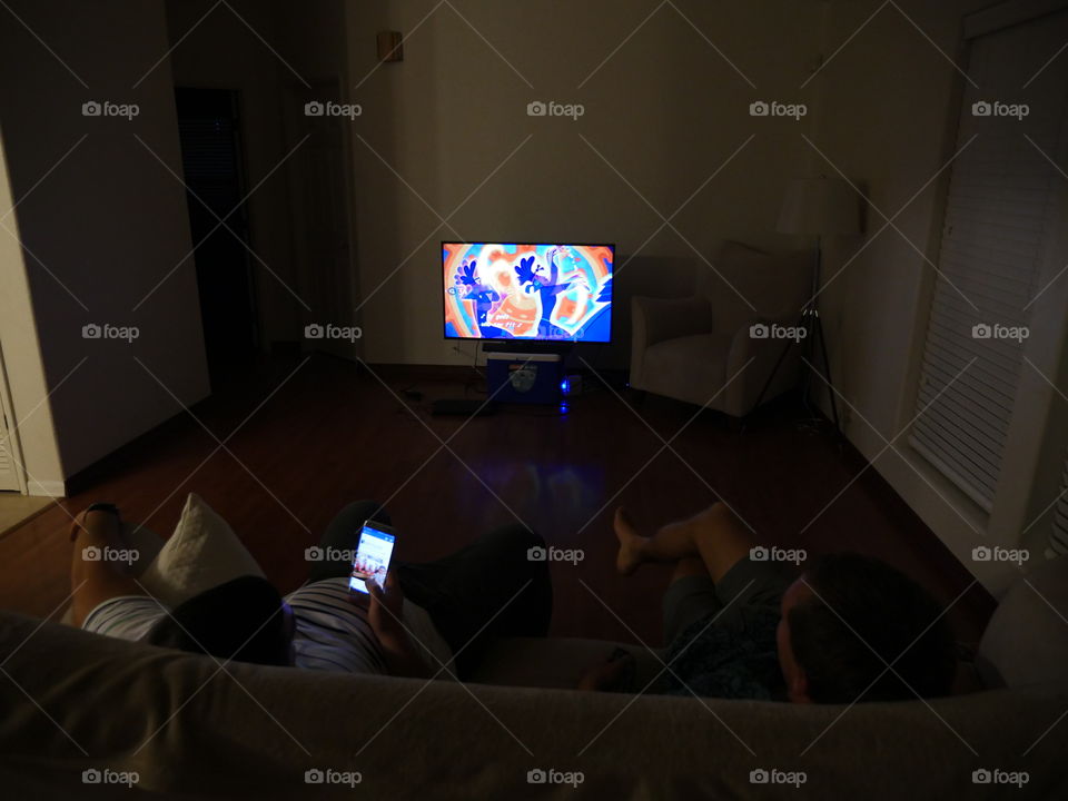 Watching tv in a dark room