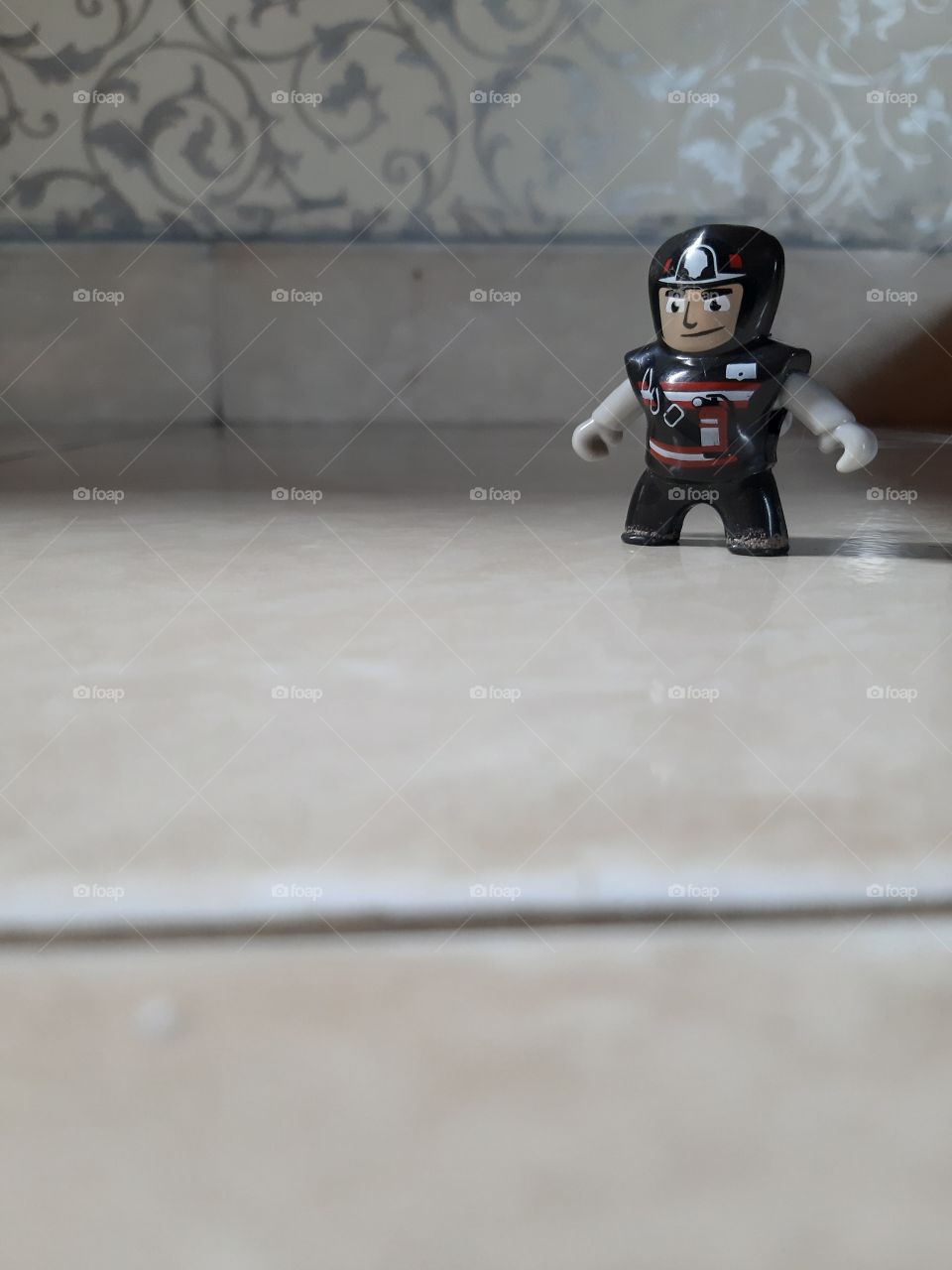 A mini black figure as a toy children