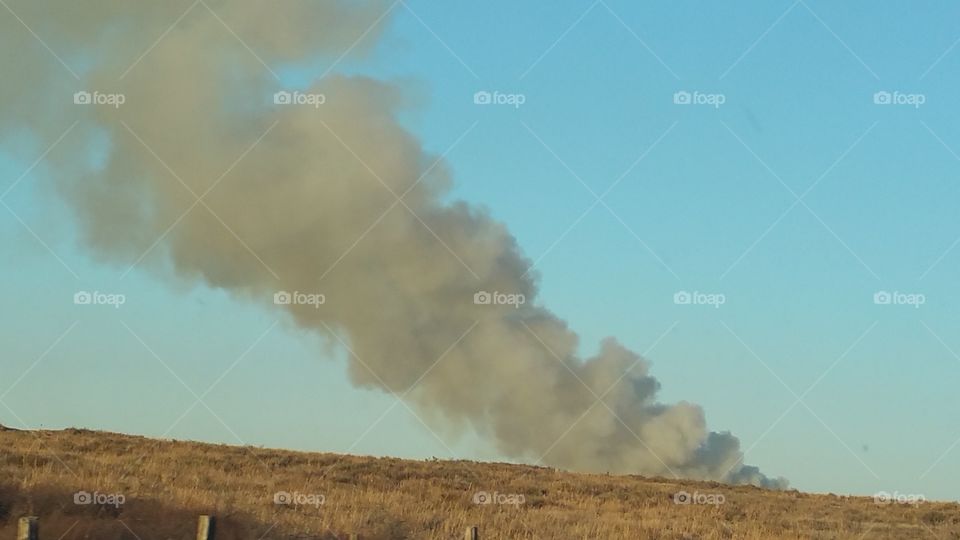 Cloud of Smoke. Burning field
