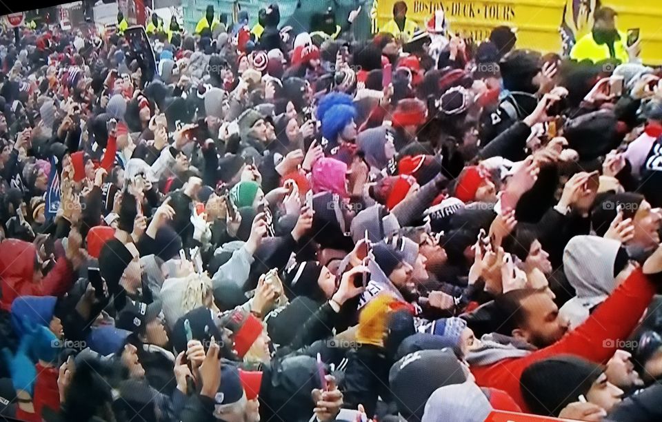 Boston parade crowd celebrating New England football's World  Championship 2017.