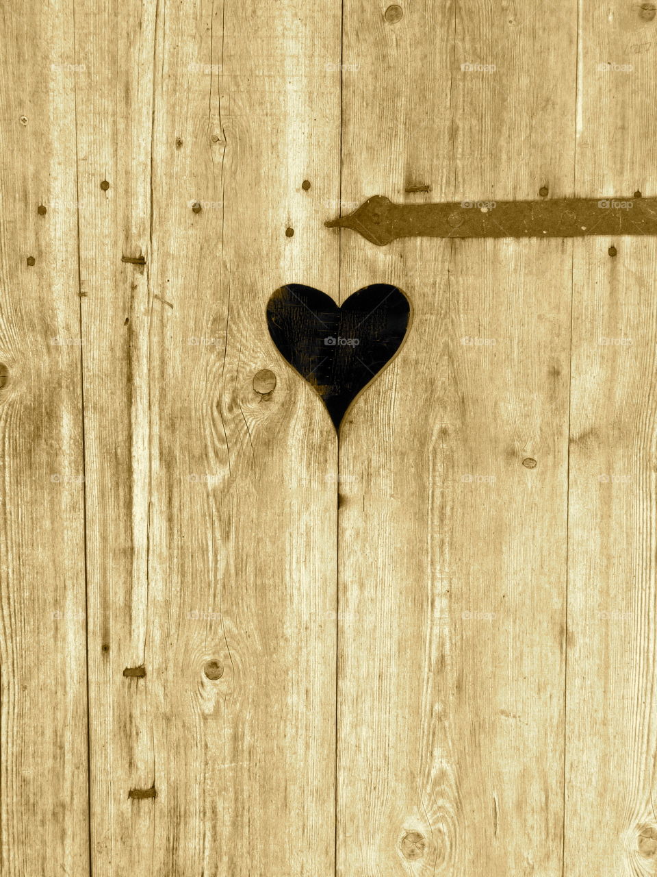 Wooden door with heart