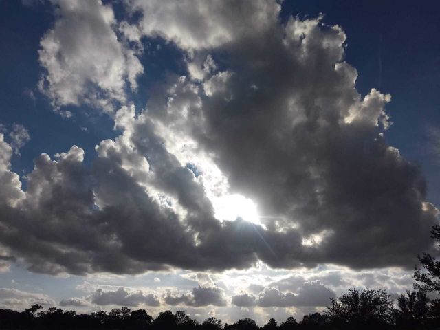 Sun shining through the clouds