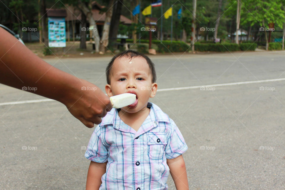 young boy eating ice-cream 