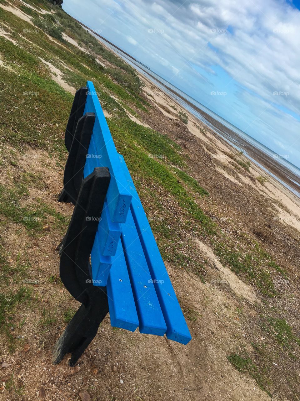 Blue bench on remote south Australian beach