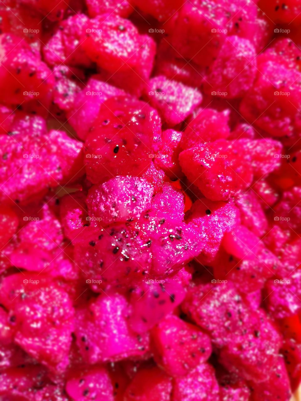 Close up of pink dragon fruit chopped up