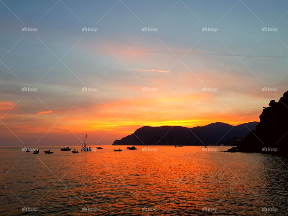 Scenic view of sea during sunset, Manarola, Italy