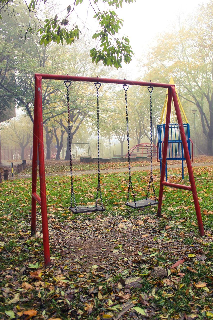 Autumn scene of empty children's playground in the public park