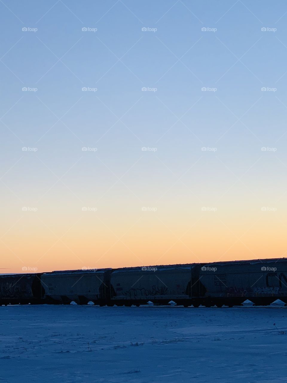Sunset behind a train 
