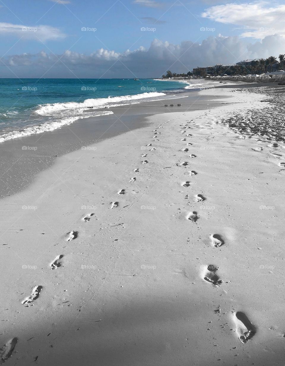 Footprints along the shore
