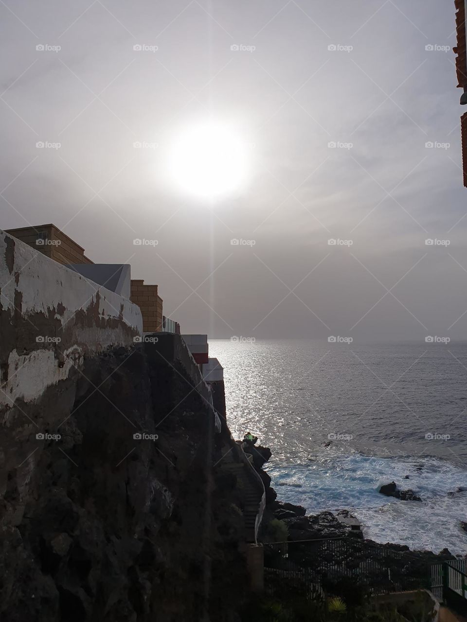 sunset at the coast- overlooking the calm sea