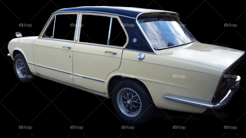 Triumph  back / left side view Isolated on BLACK

1975 Triumph Dolomite,
Honeysuckle paint