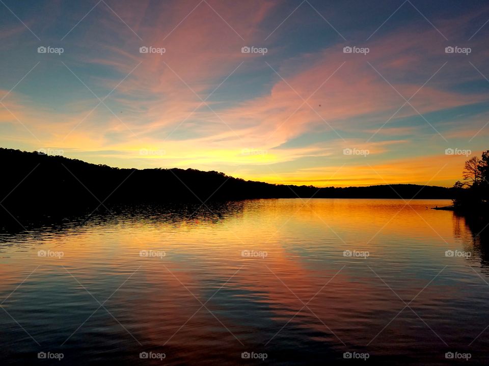 dramatic sunset over lake