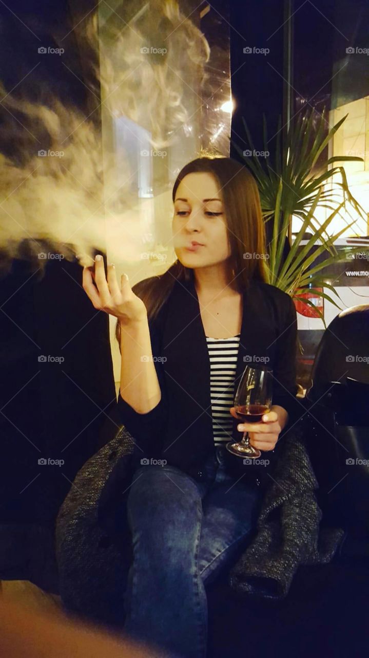 Girl smoke cigars