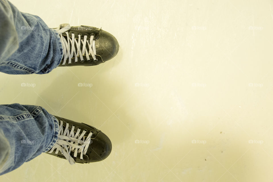 Ice skates in a ice rink.