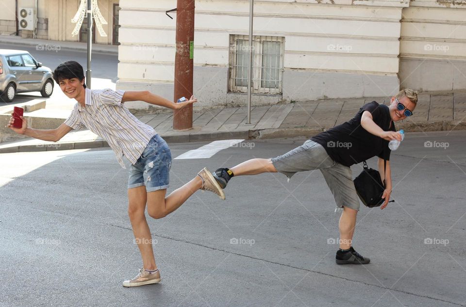 Young women having fun at the street