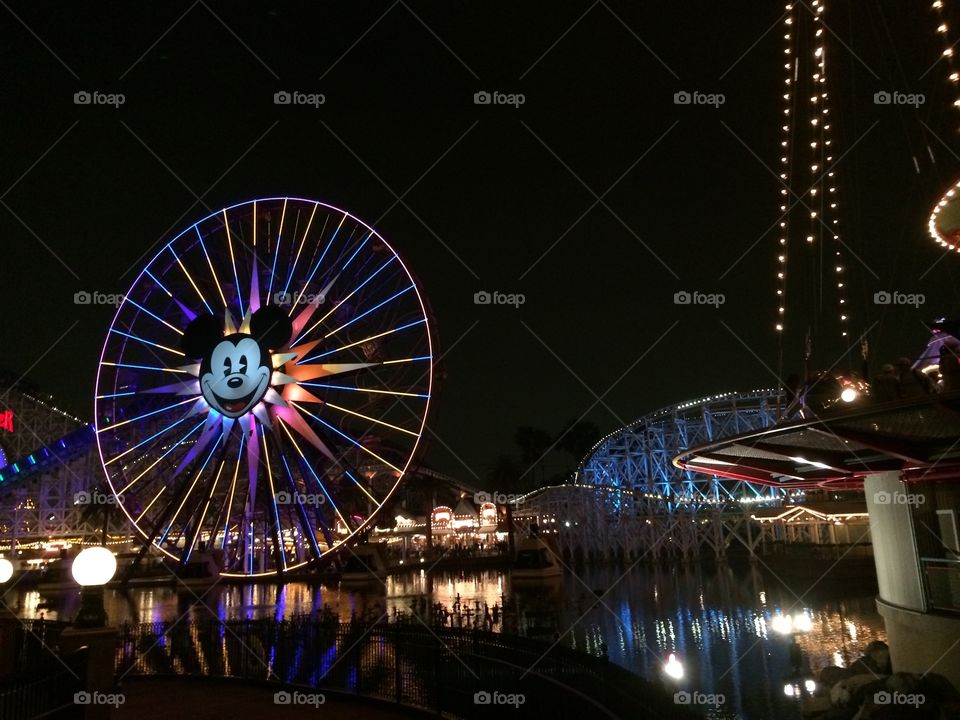 Reflection of the California adventure lights on the water. 