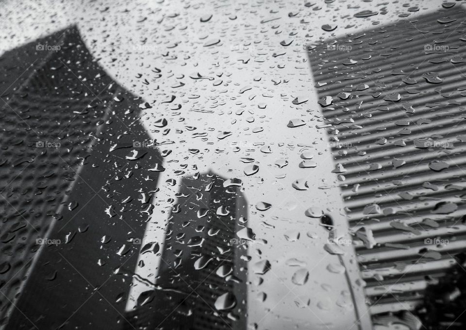 Black and white buildings reflection, rainy day