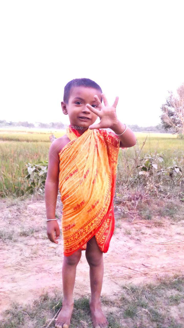 funny kid with funny dress.