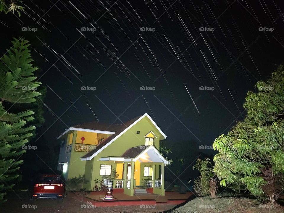 home with star trail