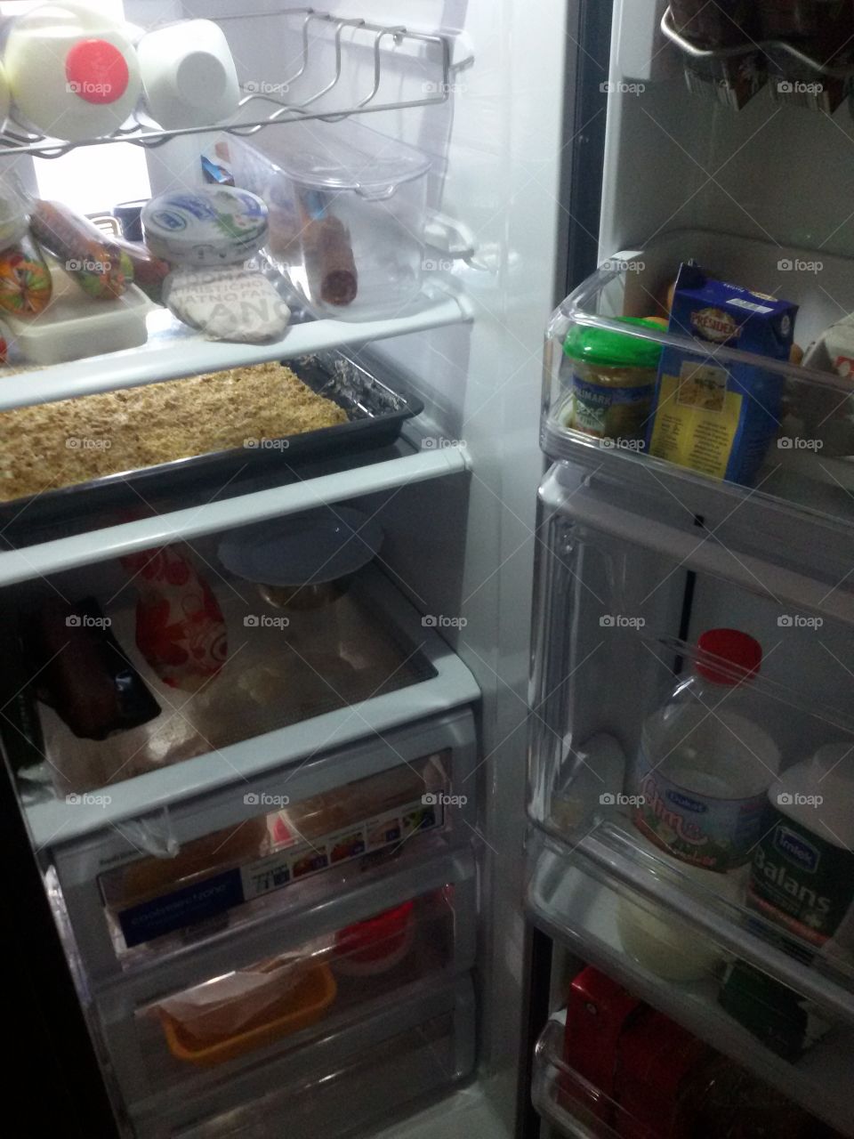 open fridge with food and drink